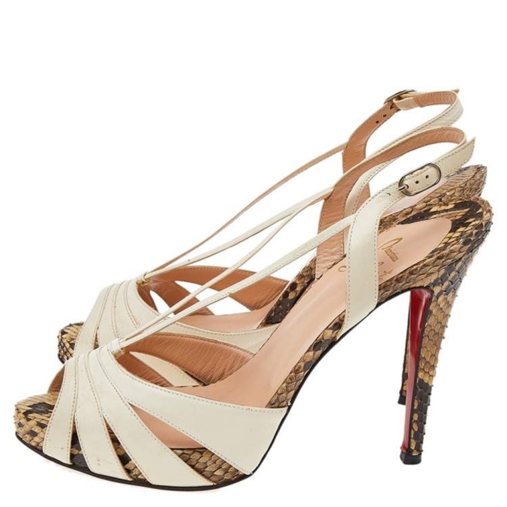 Christian Louboutin Cream Python Snakeskin Heels.
“Activa” style.